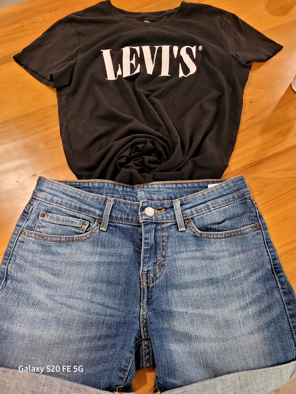 Levi's Women's Blue Denim Shorts - Classic 5-Pocket With A Black Levi's Tee